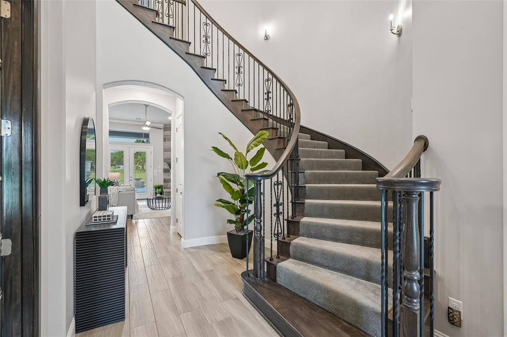 1657 Florence Road Keller, TX 76262 - Photo 4 of 40 a view of entryway and hall with wooden floor