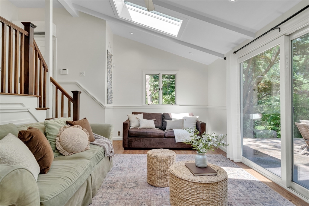 357 Lincoln Street Lexington, MA 02421 - Photo 16 of 29 a living room with furniture and a large window