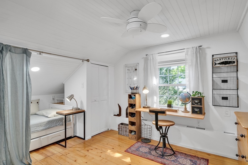 357 Lincoln Street Lexington, MA 02421 - Photo 21 of 29 a view of a workspace with furniture and a window