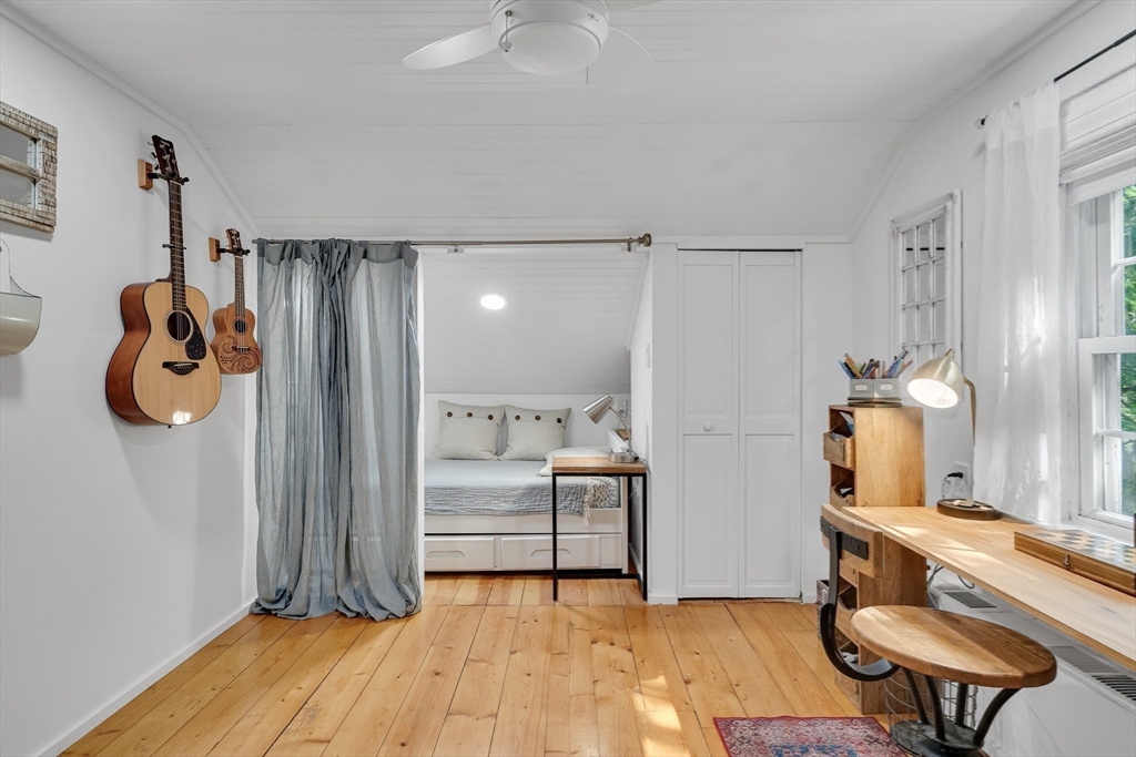 357 Lincoln Street Lexington, MA 02421 - Photo 22 of 29 a living room with furniture and a table