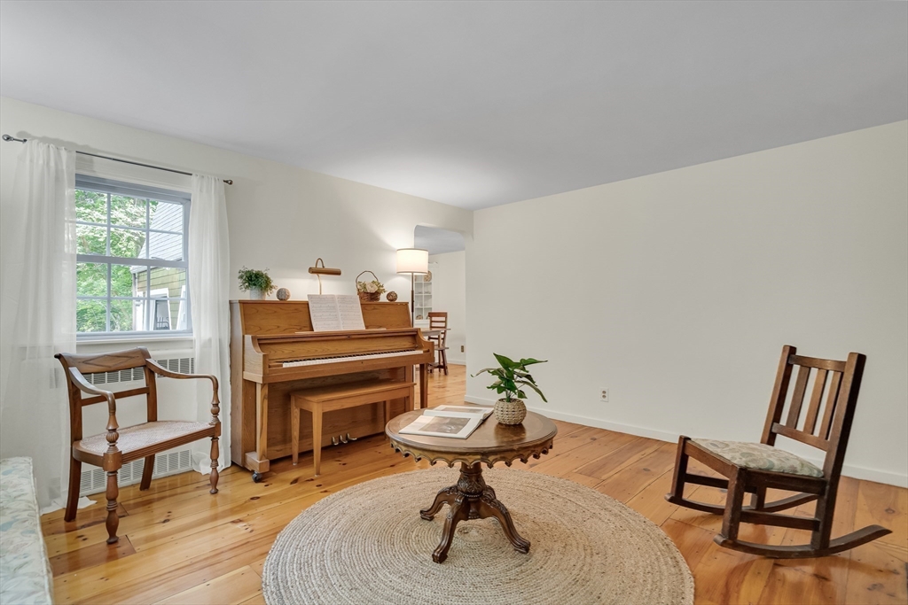 357 Lincoln Street Lexington, MA 02421 - Photo 4 of 29 a bedroom with furniture and a window