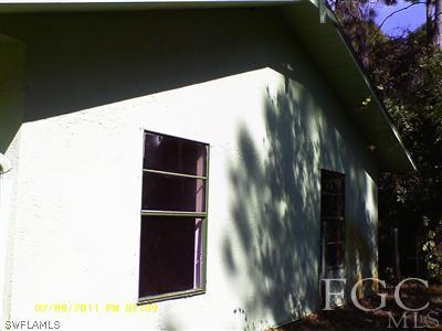 18277 Apple Road Fort Myers, FL 33967 - Photo 3 of 8 a view of a wooden door