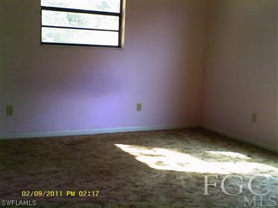 18277 Apple Road Fort Myers, FL 33967 - Photo 6 of 8 a view of empty room with window