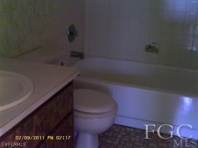 18277 Apple Road Fort Myers, FL 33967 - Photo 7 of 8 a bathroom with a sink and toilet