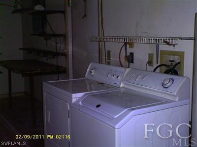 18277 Apple Road Fort Myers, FL 33967 - Photo 8 of 8 a utility room with dryer and washer