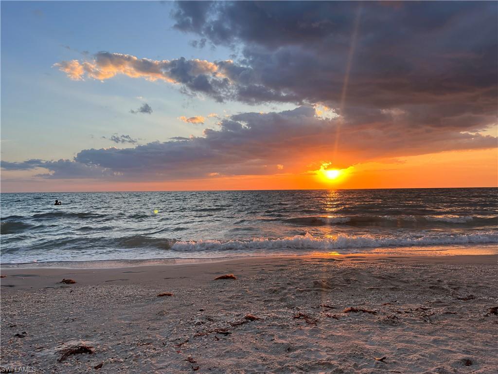 75 St Andrews Boulevard, Unit C301 Naples, FL 34113 - Photo 40 of 41 a view of an ocean beach