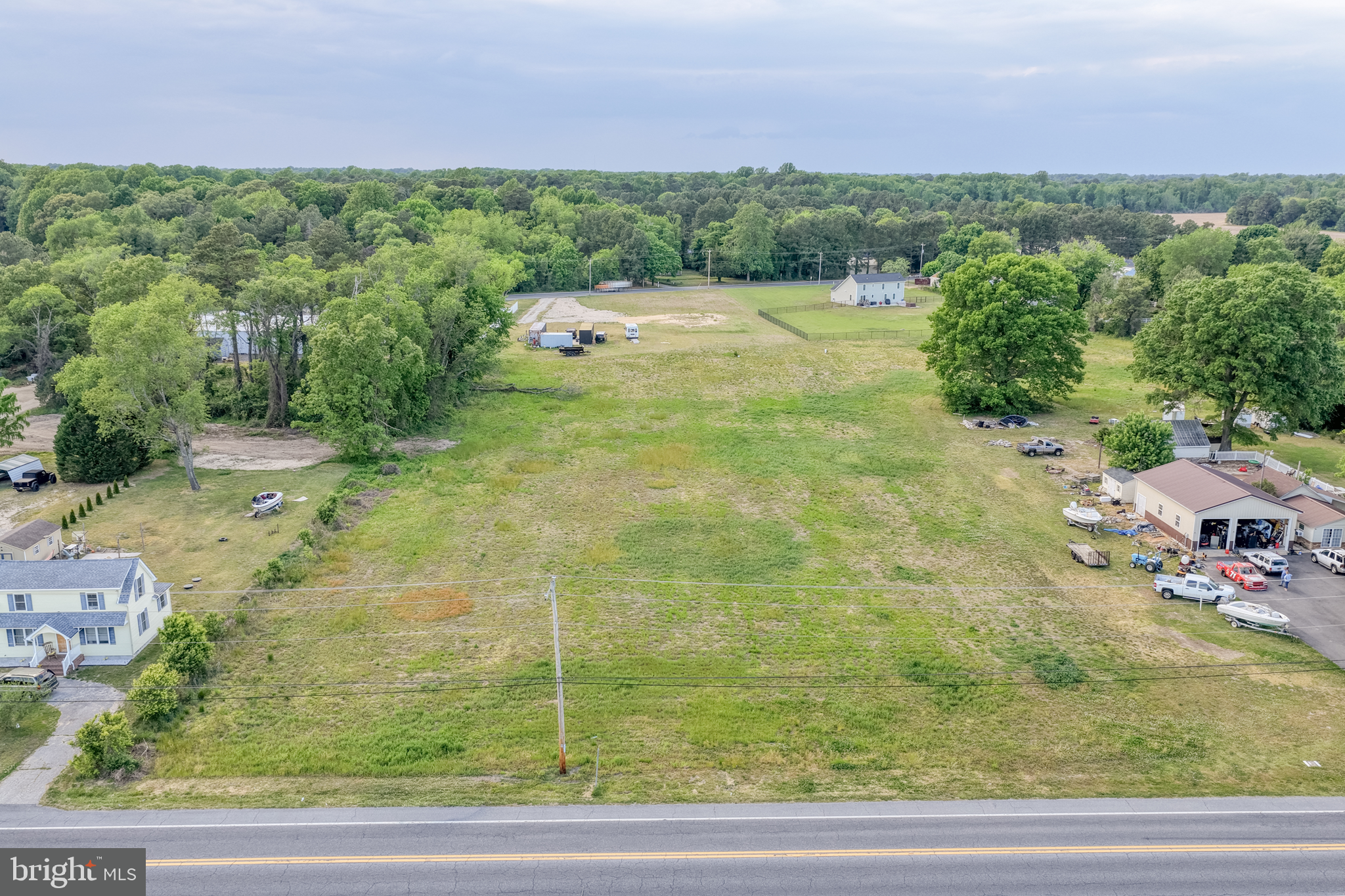 6850 Shawnee Road Milford, DE 19963 - Photo 2 of 15 a view of a yard with an outdoor space