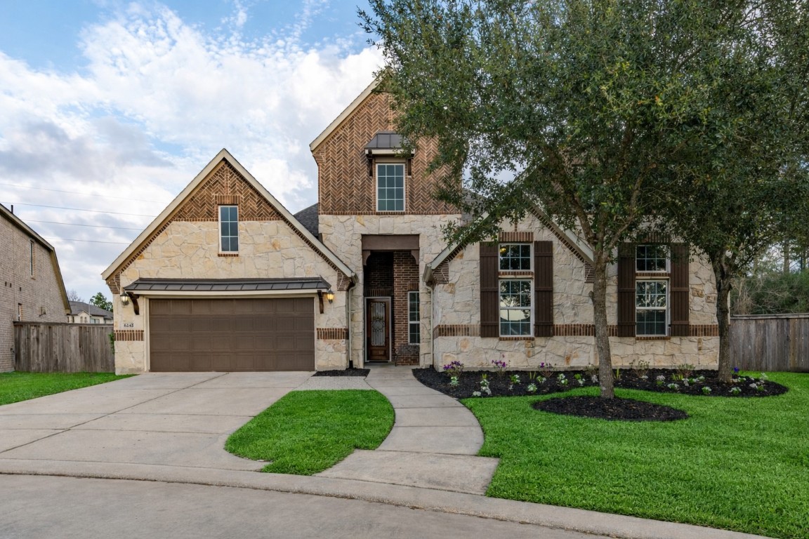 6242 Avon Landing Lane Spring, TX 77379 - Photo 1 of 42 front view of a house with a yard