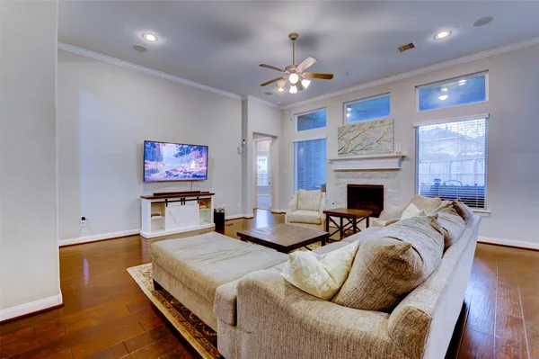 a bathroom with a granite countertop sink a mirror and a shower