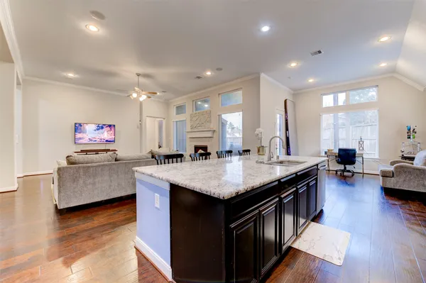a view of walk in closet with clothes
