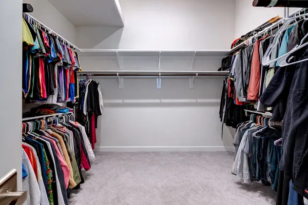 a front view of a house with a yard table and chairs