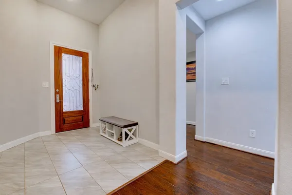 a kitchen with stainless steel appliances granite countertop a refrigerator stove microwave and sink