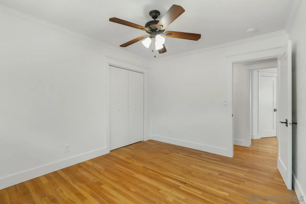 11823 Rocoso Road Lakeside, CA 92040 - Photo 20 of 48 a view of an empty room with wooden floor