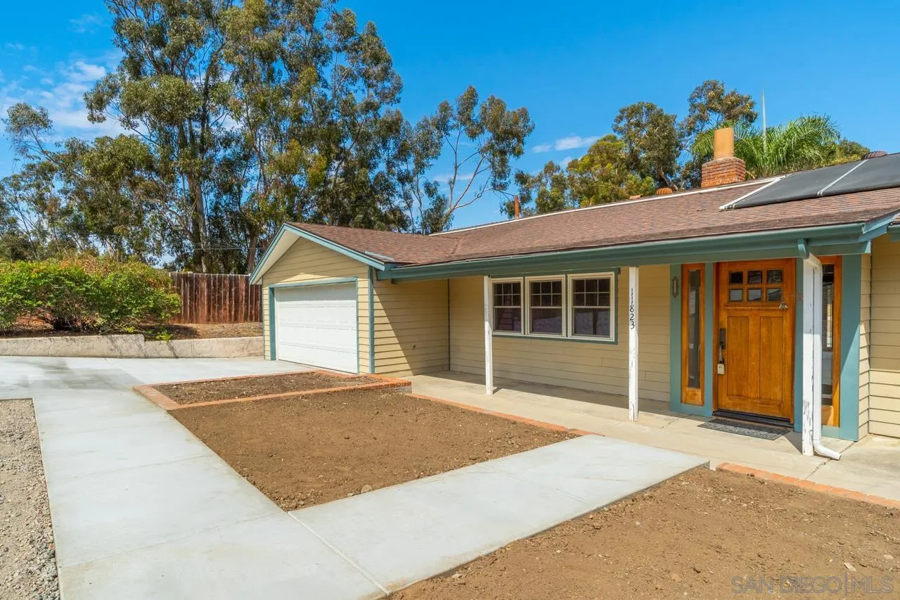 11823 Rocoso Road Lakeside, CA 92040 - Photo 44 of 48 a front view of a house with a garden