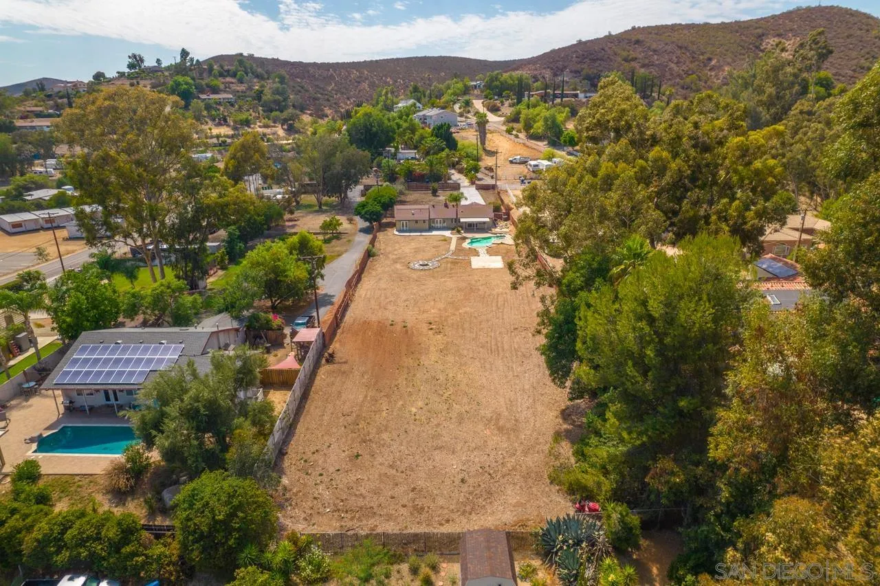 11823 Rocoso Road Lakeside, CA 92040 - Photo 45 of 48 an aerial view of residential houses with outdoor space and trees