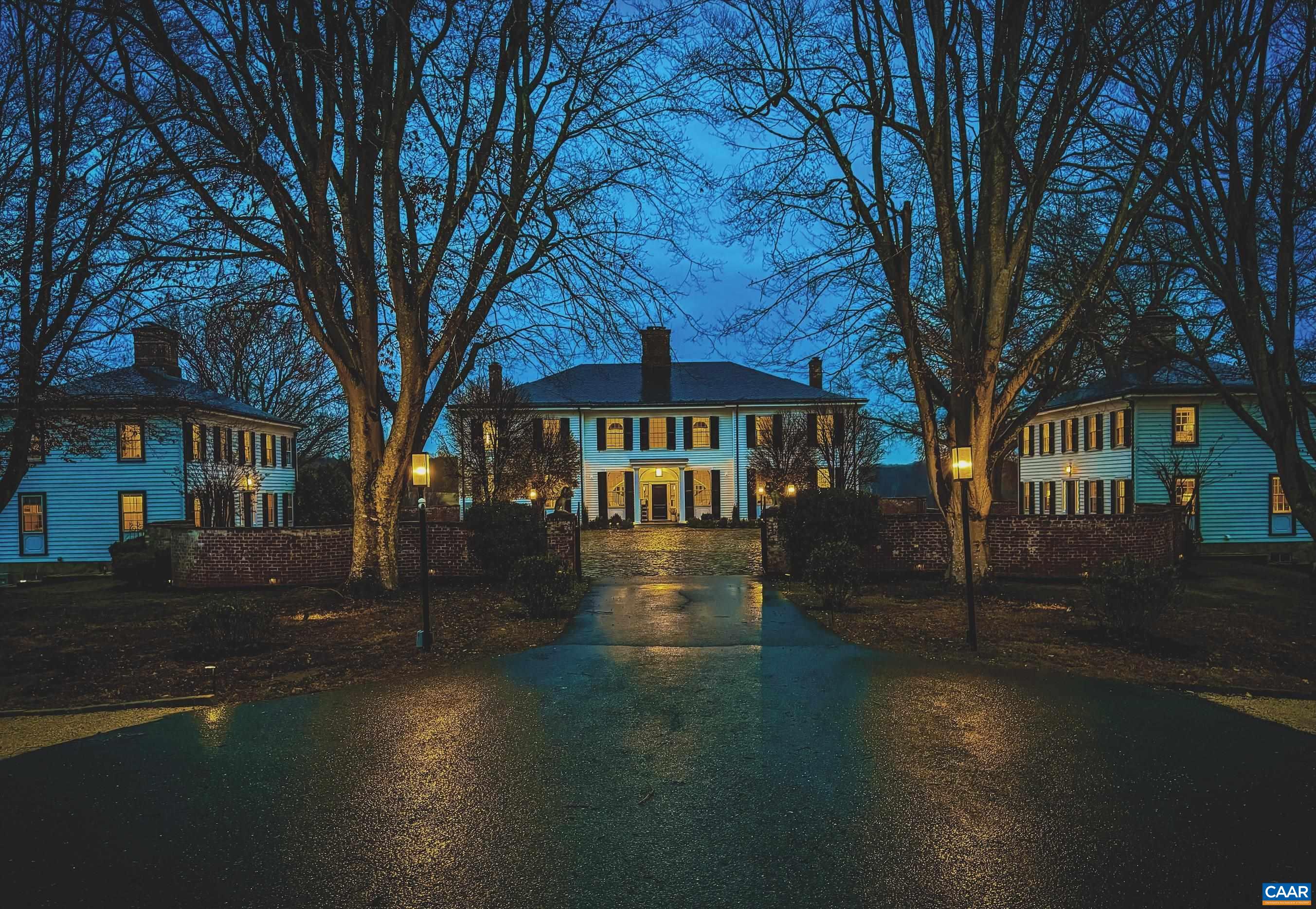 Georgian Manor home with two mirror image companion residences.