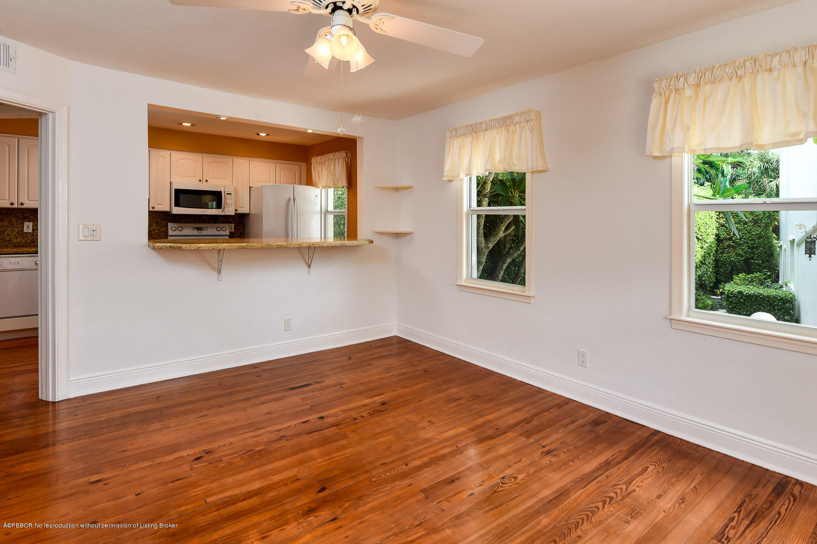 142 South County Road Palm Beach, FL 33480 - Photo 10 of 12 a view of empty room with wooden floor and fan