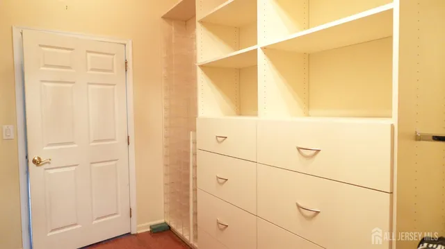 a close view of a shower and a sink