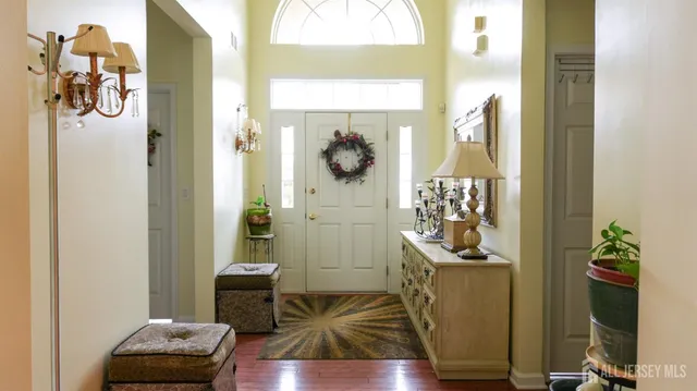 a room with a table and a potted plant