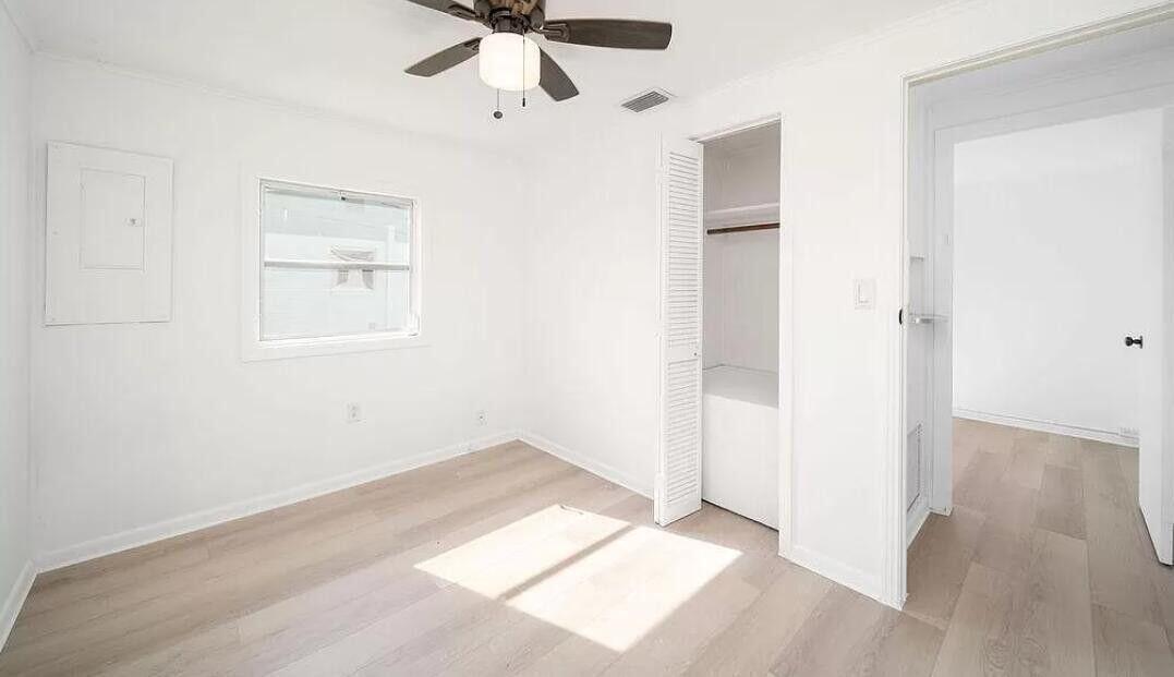 1520 Hunter Road Okeechobee, FL 34974 - Photo 11 of 20 an empty room with fan and windows