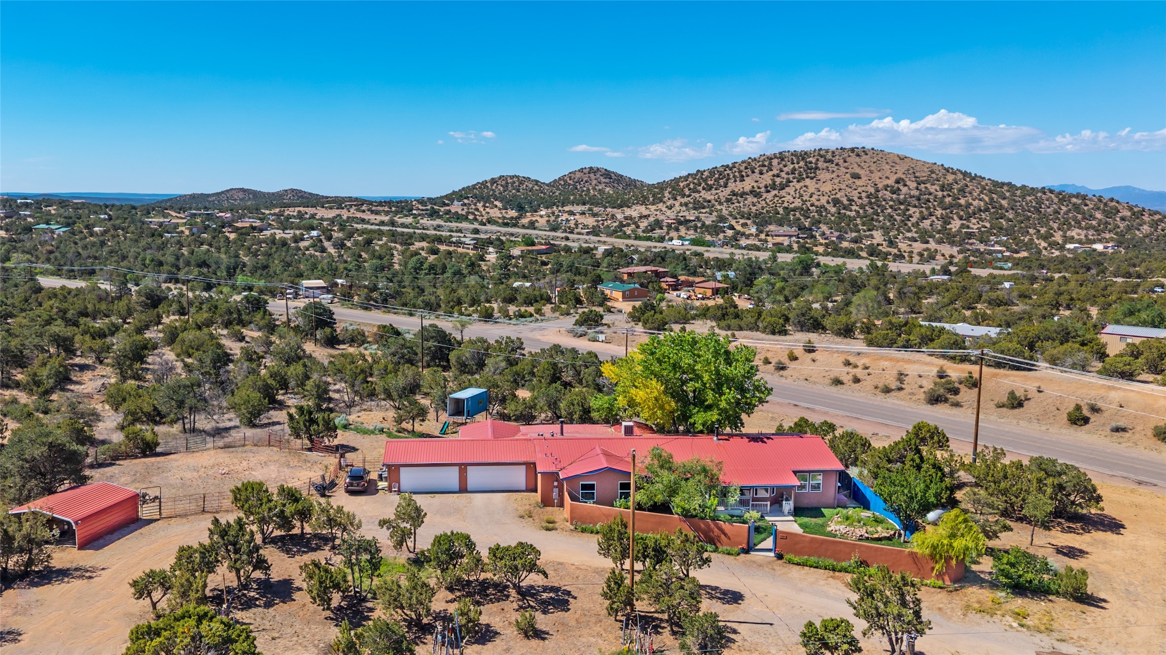 12 Apache Ridge Road Santa Fe, NM 87505 - Photo 2 of 69 front of home via drone