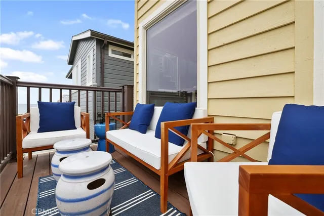 a living room with furniture window and a fireplace