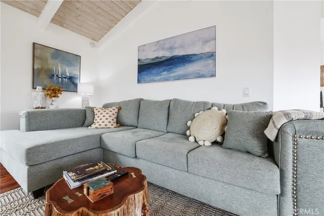 a spacious bedroom with a bed and a table