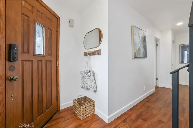 a bathroom with a sink a mirror and a toilet