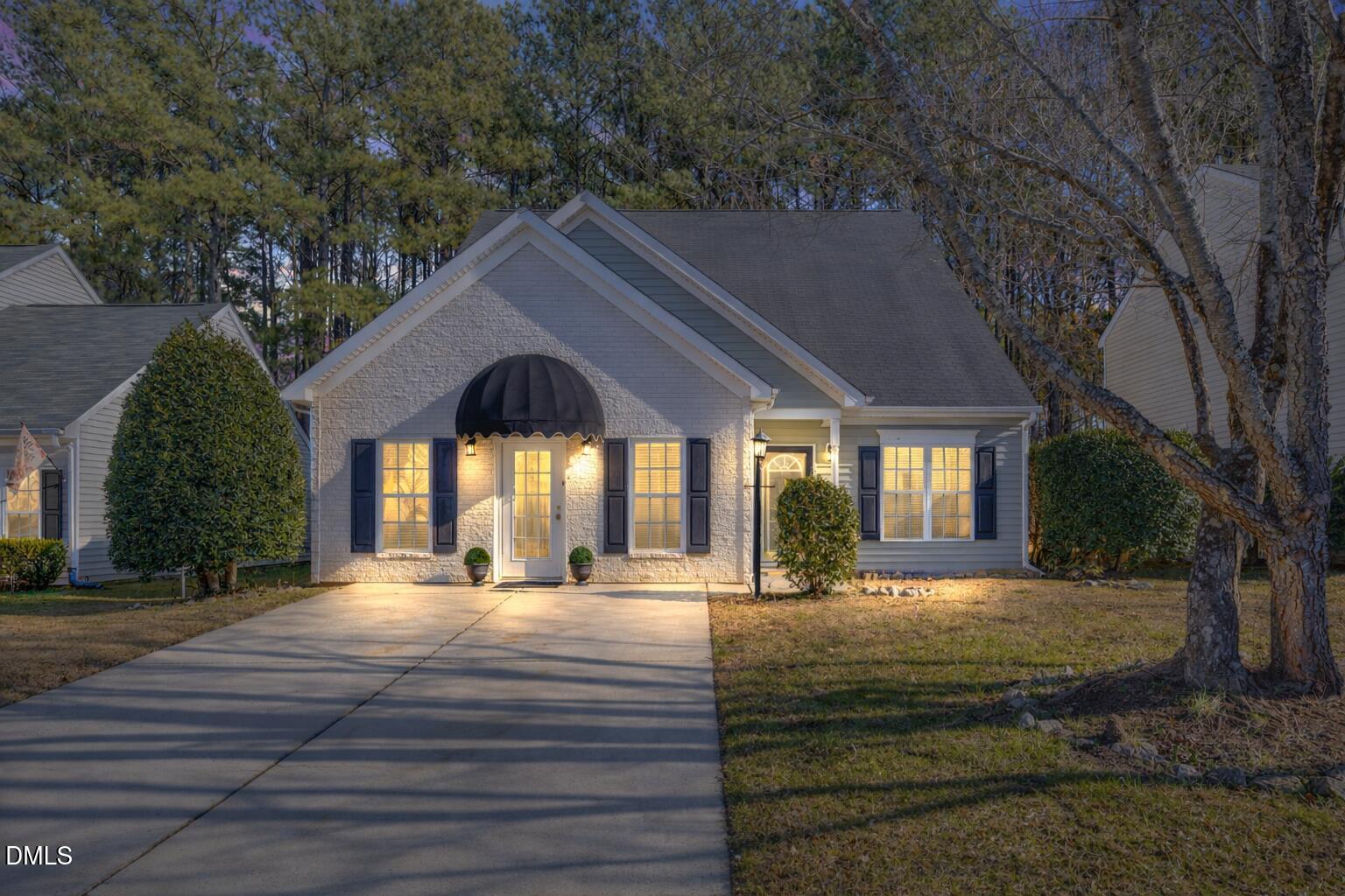 2109 Star Sapphire Drive Raleigh, NC 27610 - Photo 1 of 37 Front Exterior at Twilight