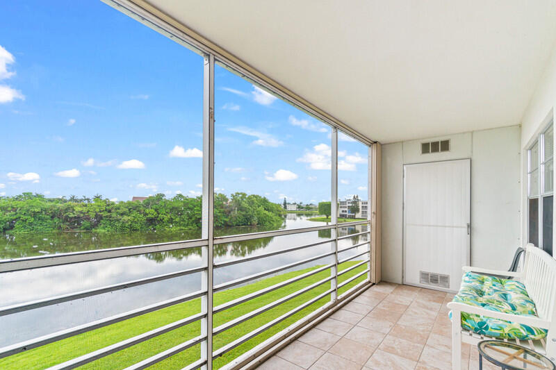 3051 Ainslie Drive Boca Raton, FL 33434 - Photo 14 of 17 Patio with Lake View