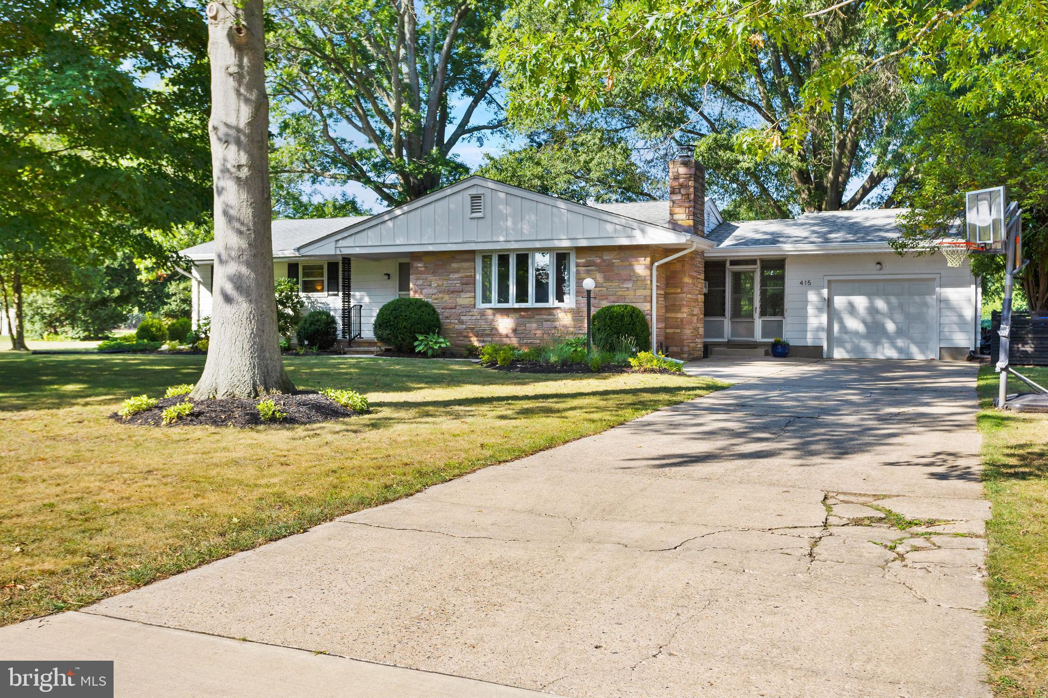 415 Ellisdale Road Chesterfield, NJ 08515 - Photo 1 of 47 a front view of a house with a yard
