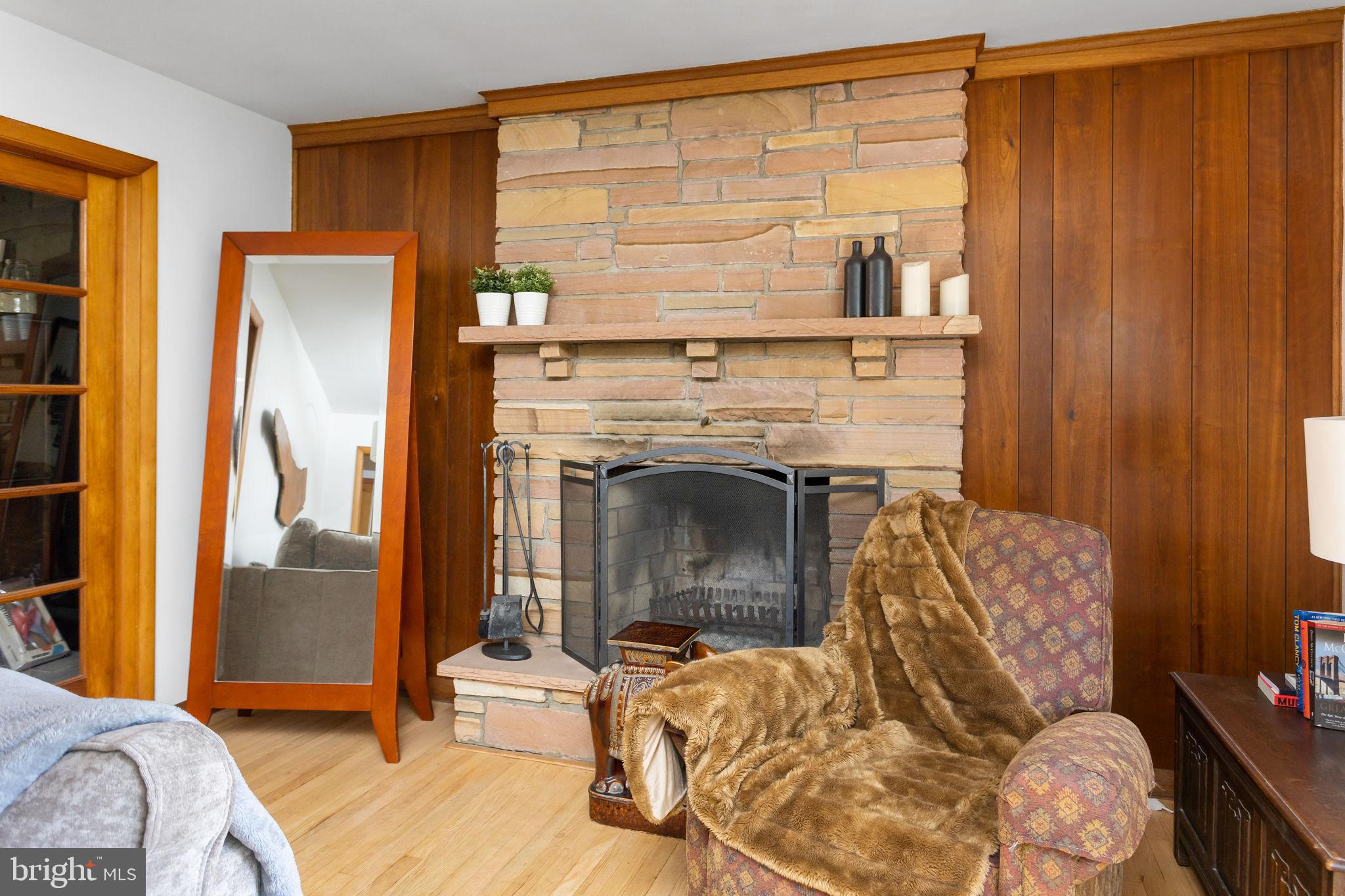 415 Ellisdale Road Chesterfield, NJ 08515 - Photo 12 of 47 a living room with furniture and a fireplace
