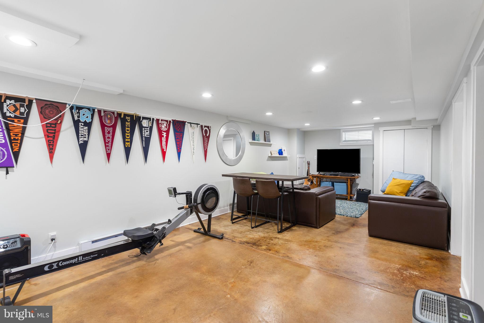 415 Ellisdale Road Chesterfield, NJ 08515 - Photo 29 of 47 a living room with furniture and a flat screen tv