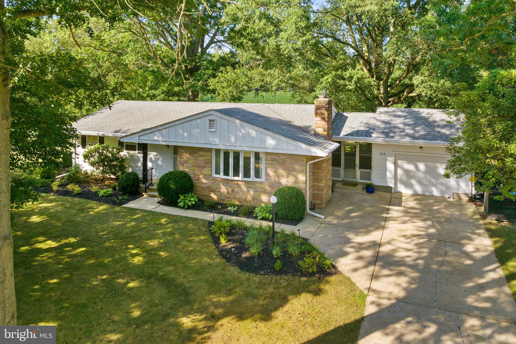 415 Ellisdale Road Chesterfield, NJ 08515 - Photo 3 of 47 a front view of a house with a yard