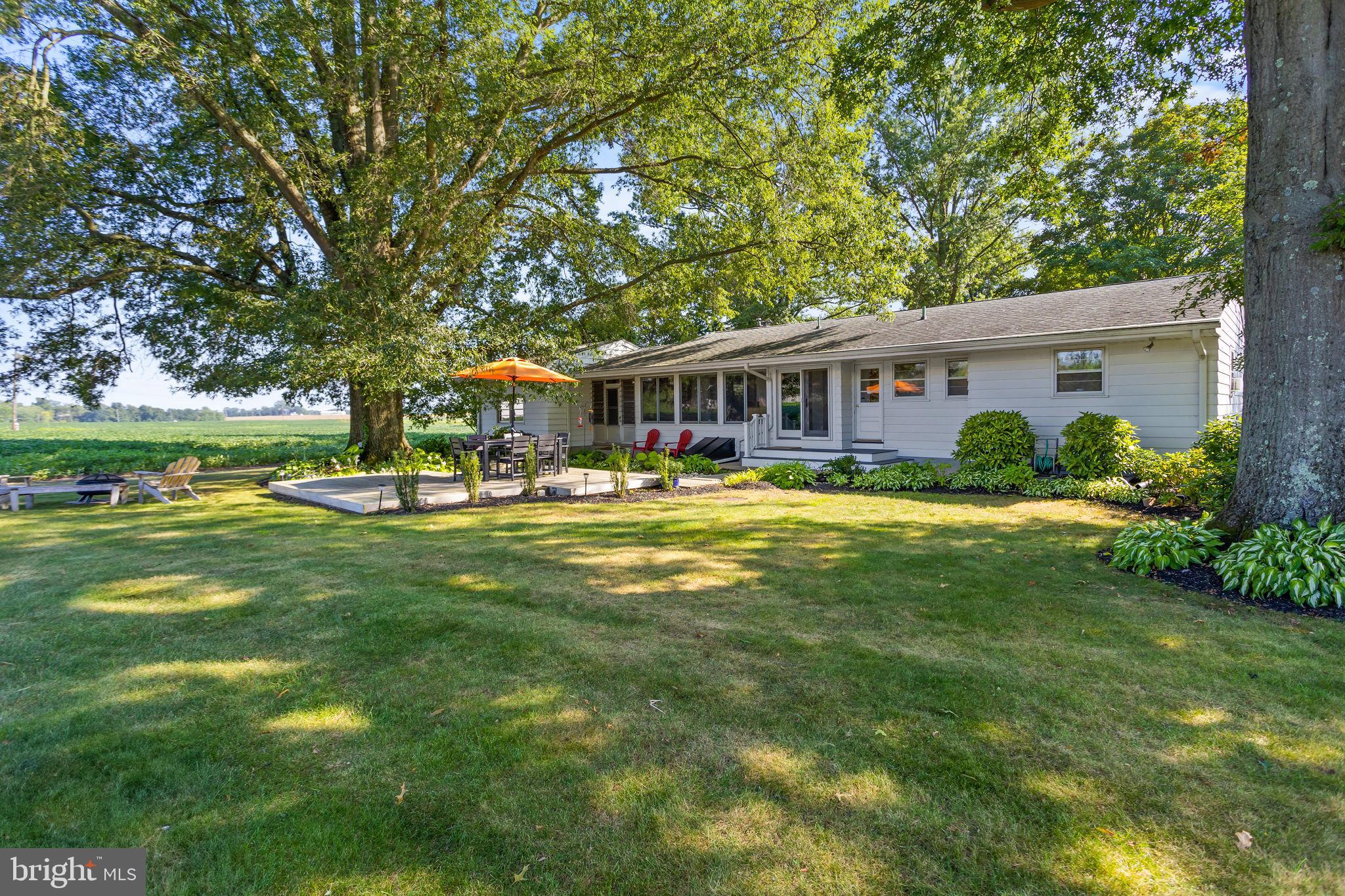 415 Ellisdale Road Chesterfield, NJ 08515 - Photo 38 of 47 a front view of house with yard and green space