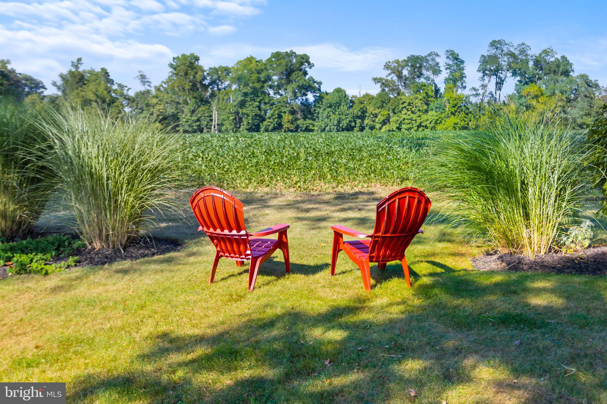 415 Ellisdale Road Chesterfield, NJ 08515 - Photo 42 of 47 a view of backyard with swimming pool and outdoor seating