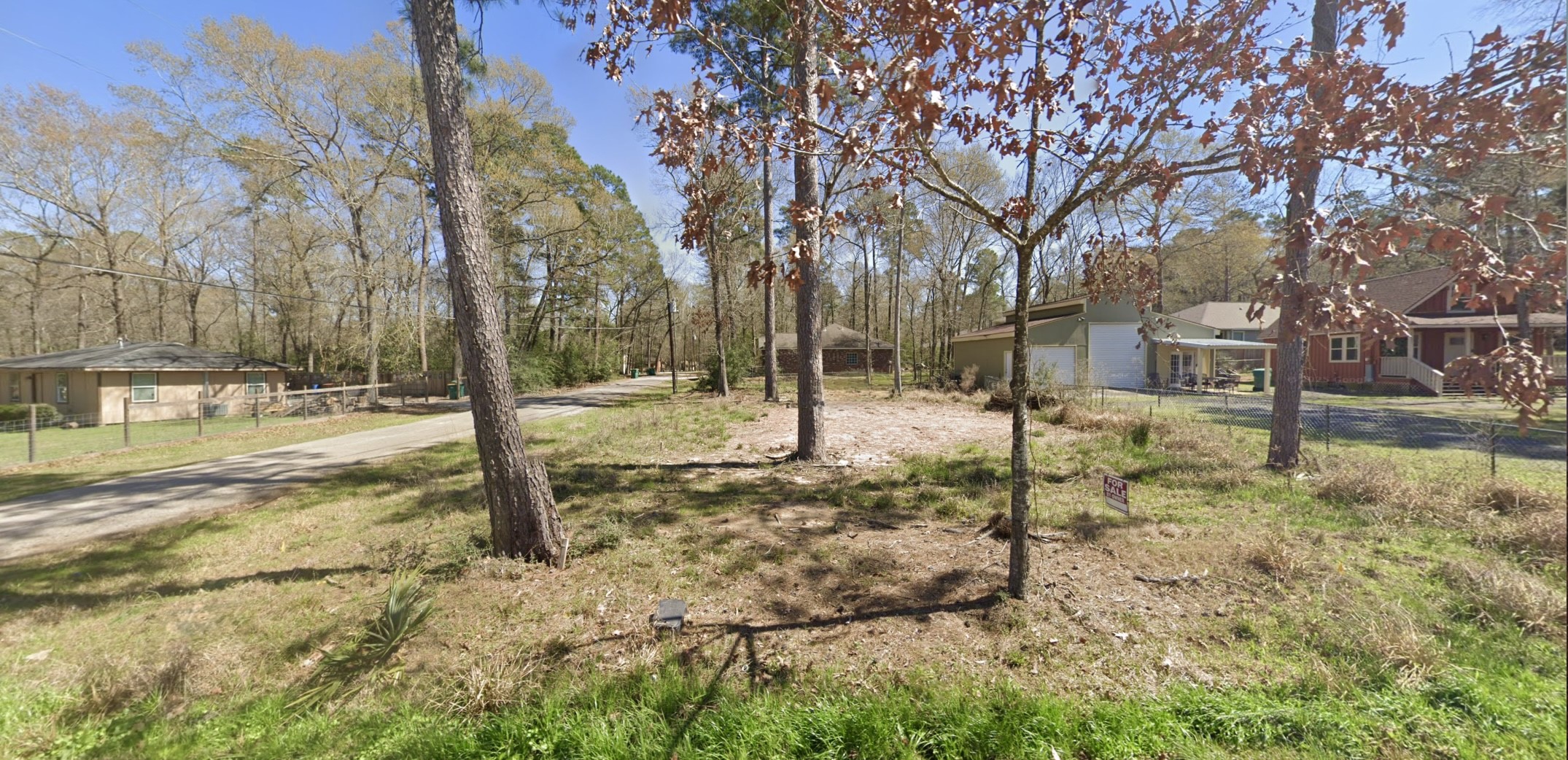 1103 Yellowstone River Road Conroe, TX 77316 - Photo 9 of 12 a view of a yard covered in snow
