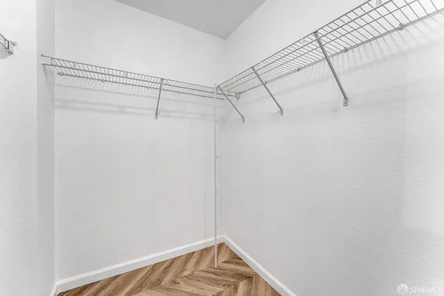 a view of a room with racks on the wall