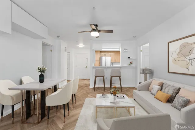 a living room with furniture and a table