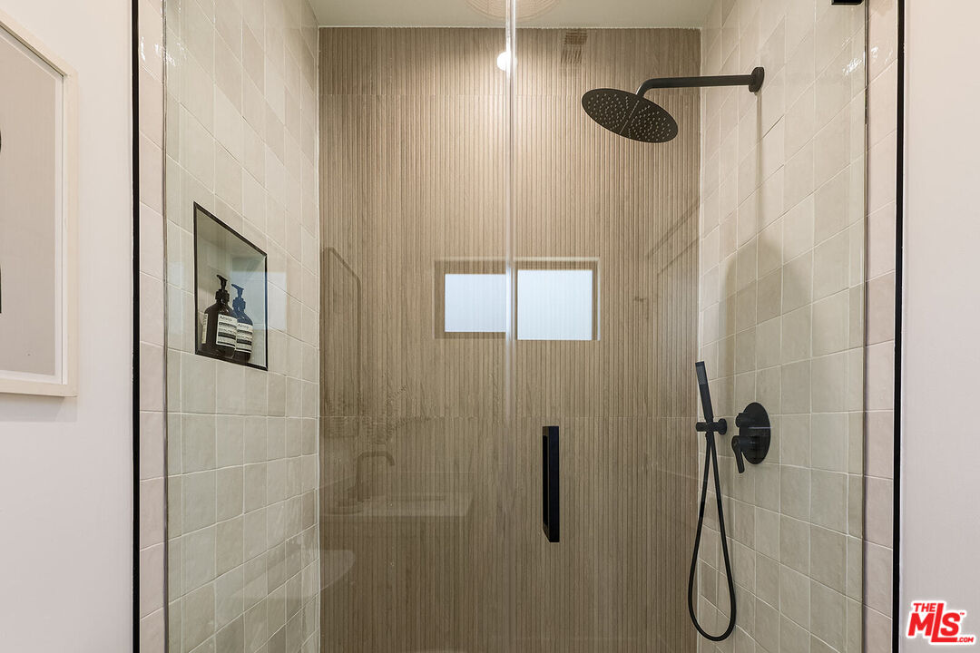5117 Coringa Drive Los Angeles, CA 90042 - Photo 20 of 27 a bathroom with a shower