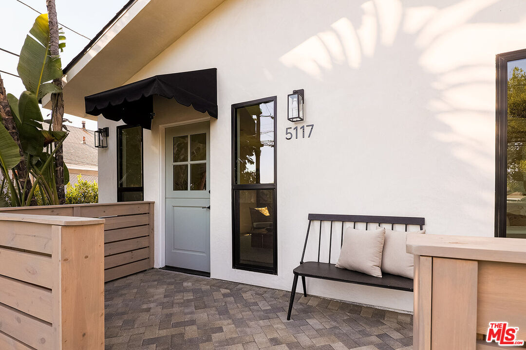 5117 Coringa Drive Los Angeles, CA 90042 - Photo 3 of 27 a view of a porch with a bench