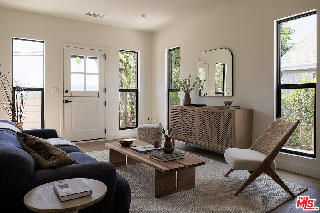 5117 Coringa Drive Los Angeles, CA 90042 - Photo 5 of 27 a living room with furniture