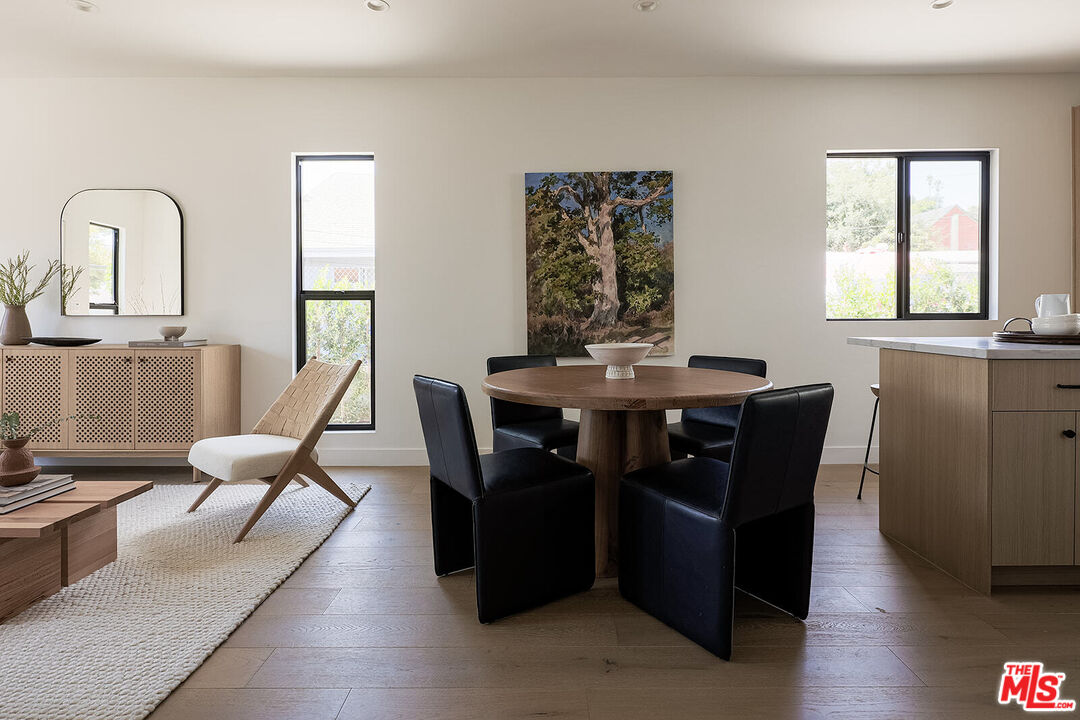 5117 Coringa Drive Los Angeles, CA 90042 - Photo 7 of 27 a dining room with furniture and window
