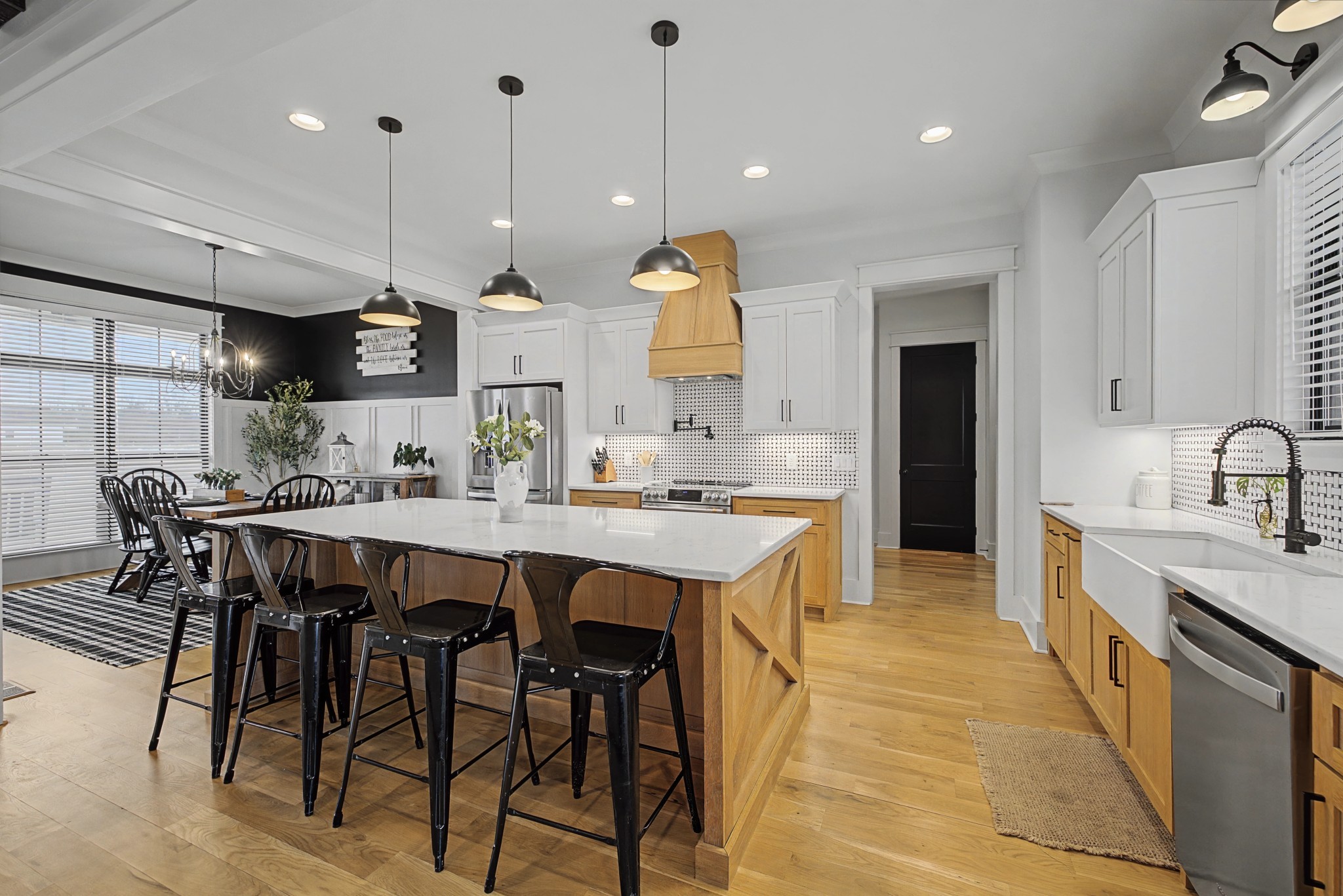 110 Squire Jones Road Bell Buckle, TN 37020 - Photo 13 of 50 a kitchen with stainless steel appliances granite countertop a sink a stove a refrigerator and island with wooden floor