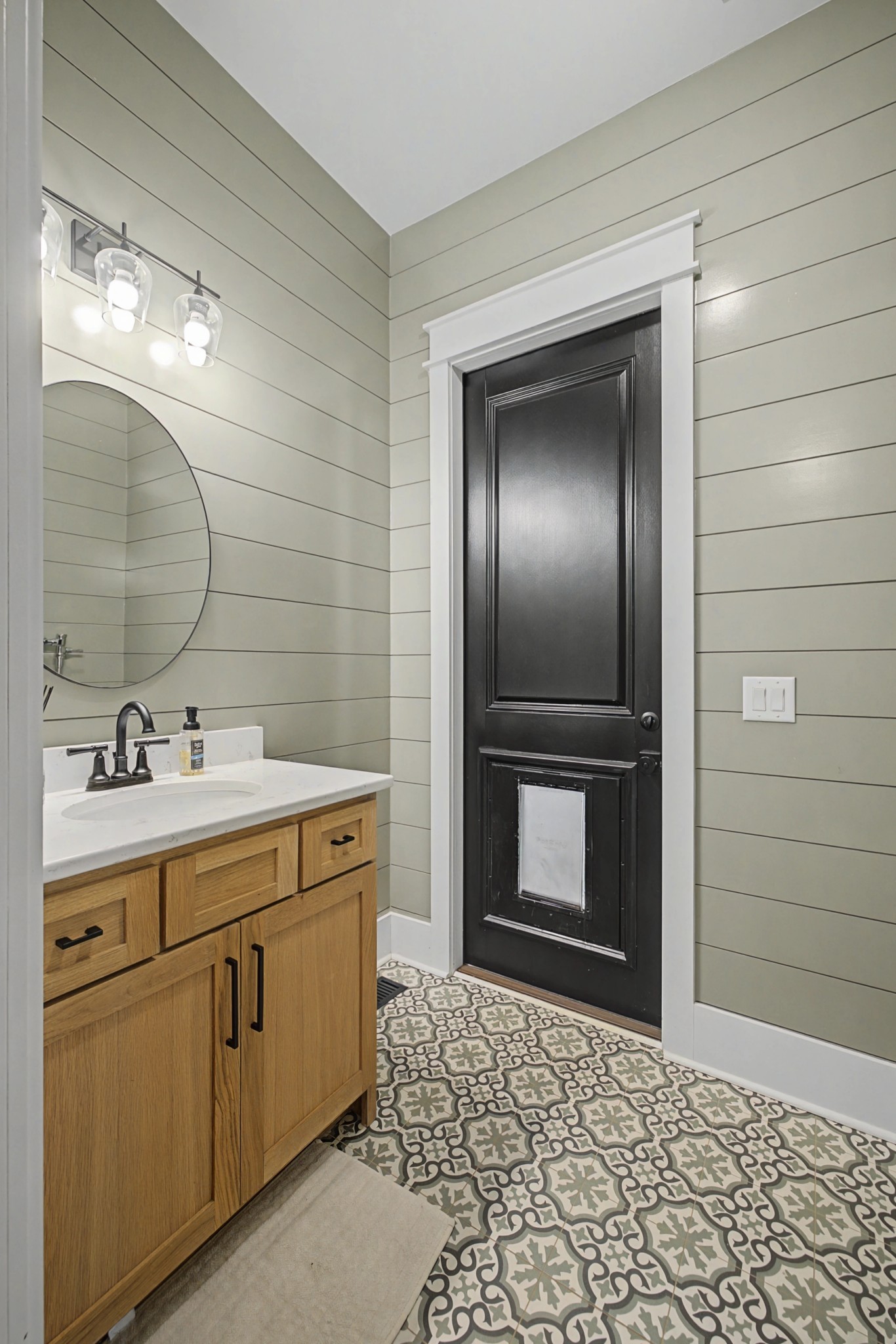 110 Squire Jones Road Bell Buckle, TN 37020 - Photo 24 of 50 a bathroom with a sink a mirror and shower