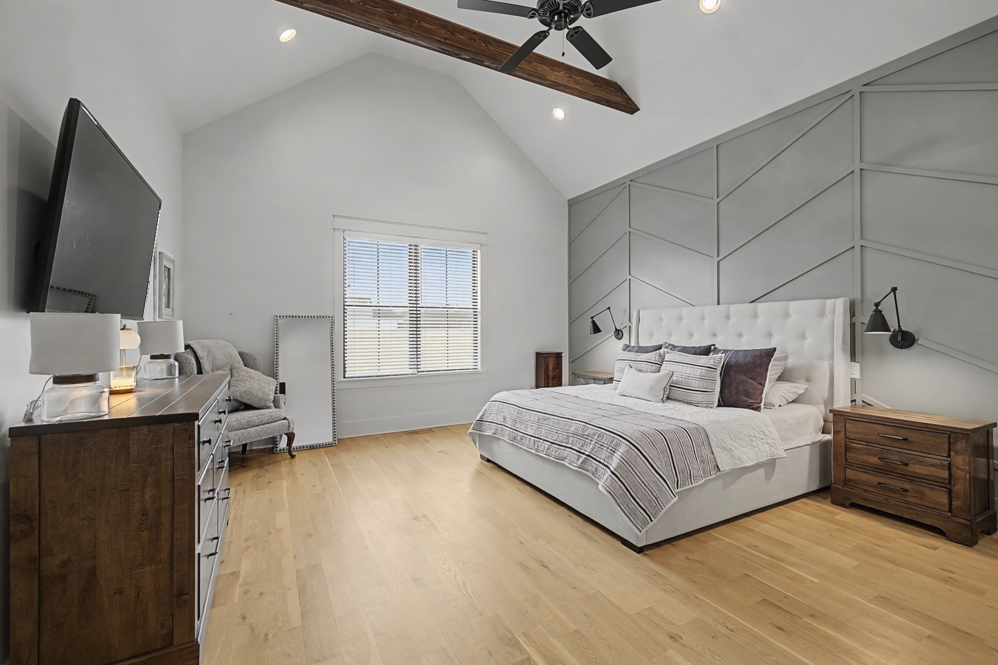 110 Squire Jones Road Bell Buckle, TN 37020 - Photo 26 of 50 a bedroom with a bed window and a flat screen tv