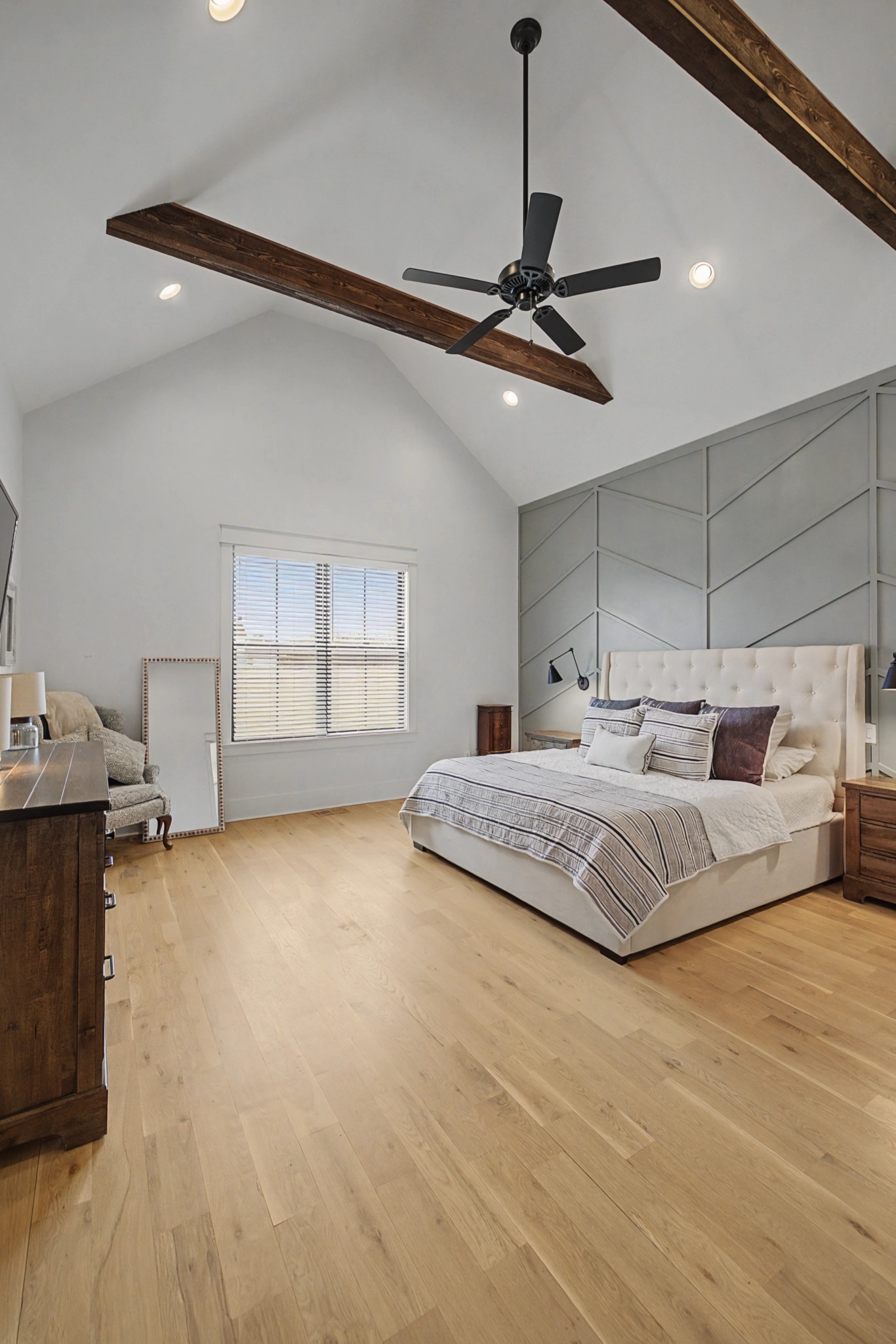 110 Squire Jones Road Bell Buckle, TN 37020 - Photo 29 of 50 a bedroom with a large bed and ceiling fan