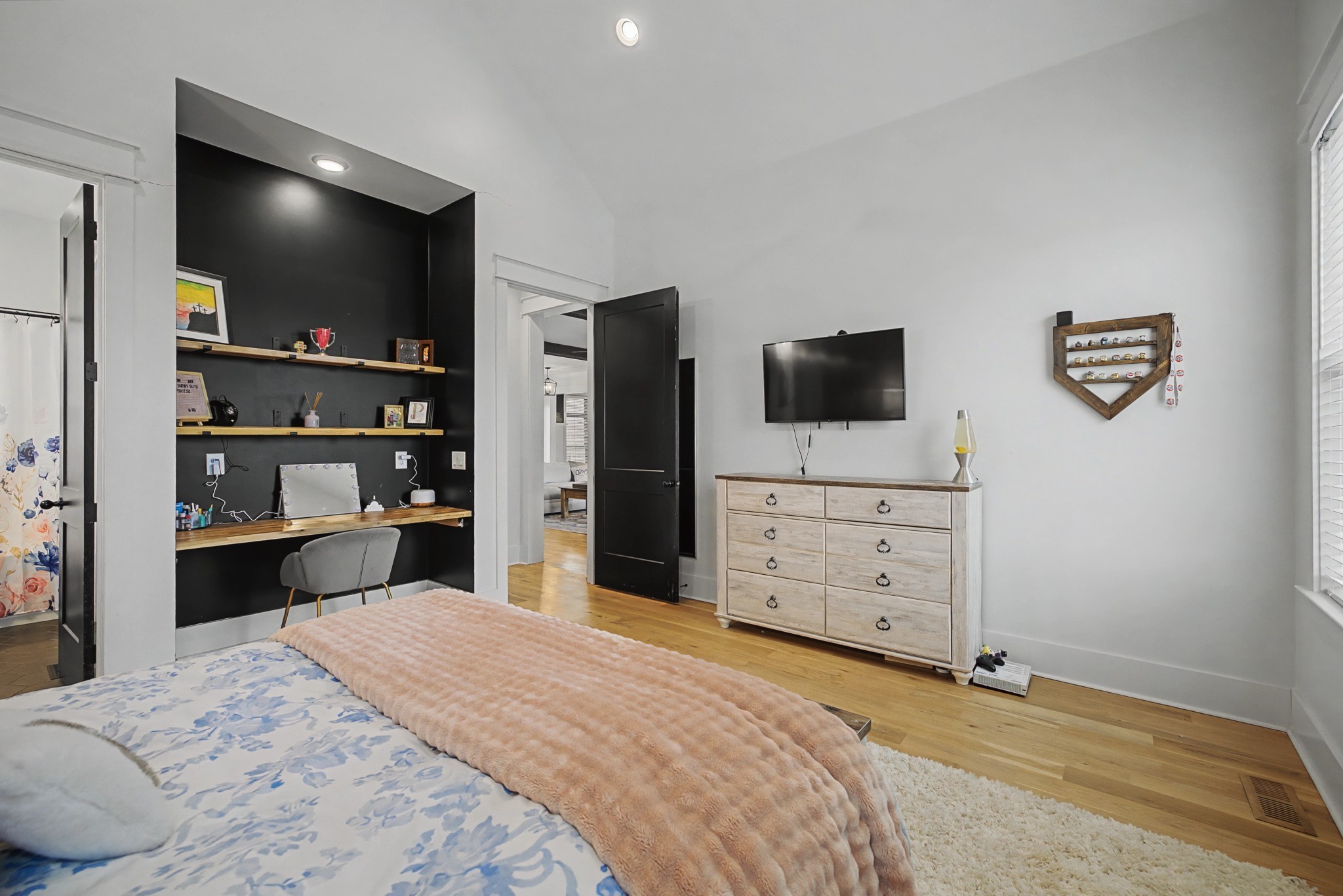 110 Squire Jones Road Bell Buckle, TN 37020 - Photo 36 of 50 a bedroom with a bed and a television