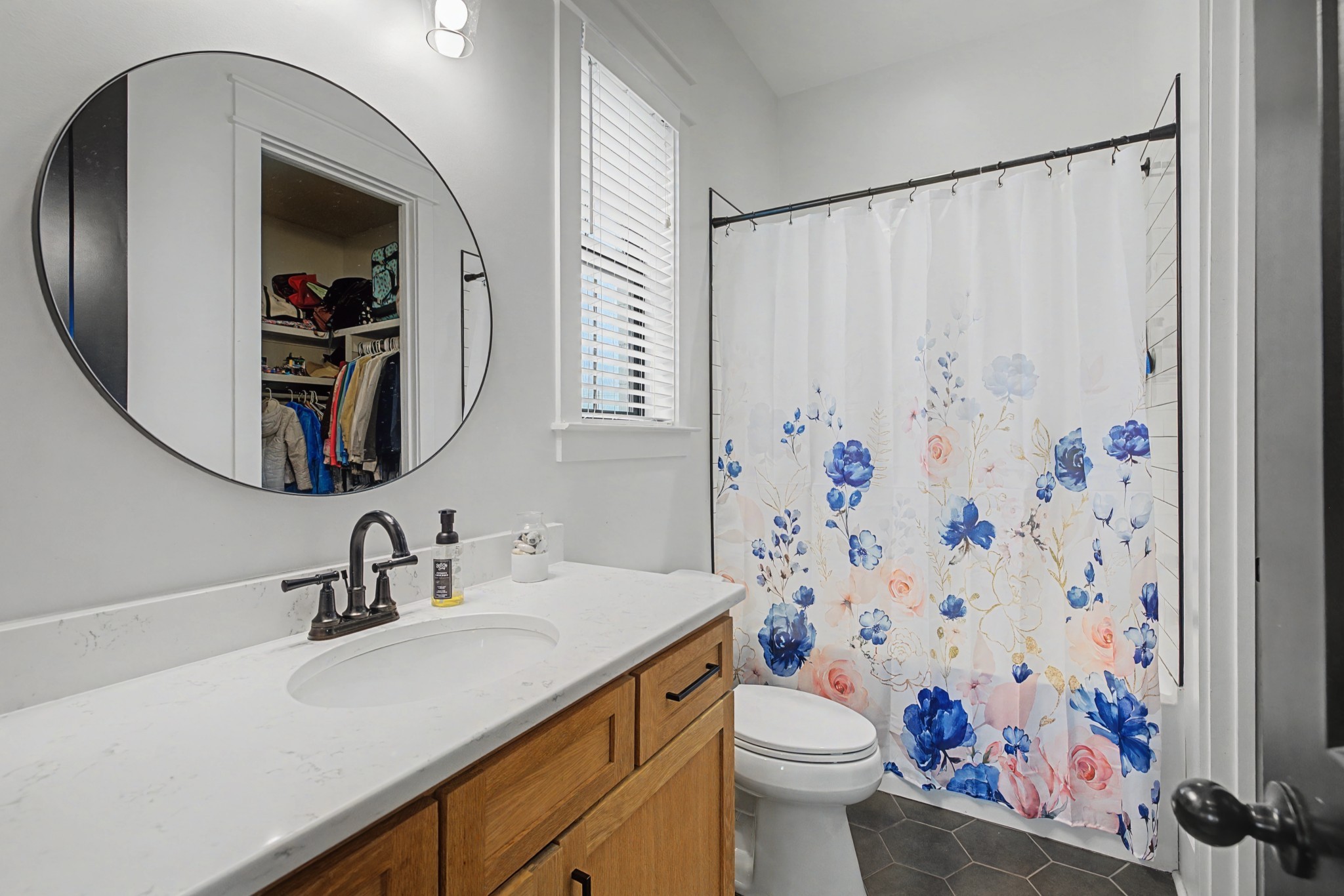 110 Squire Jones Road Bell Buckle, TN 37020 - Photo 38 of 50 a bathroom with a sink a toilet and a mirror