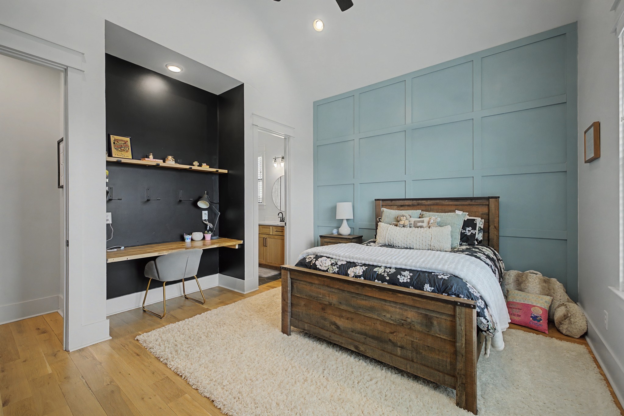 110 Squire Jones Road Bell Buckle, TN 37020 - Photo 40 of 50 a bedroom with a bed and a flat screen tv